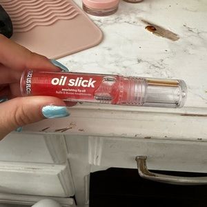Lottie oil slick lip oil